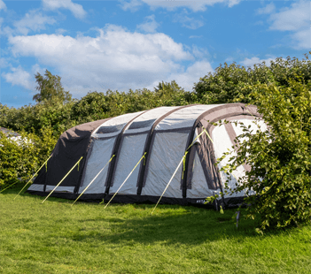 Spacious grass tent pitches